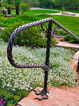 4 strand rope metal bar installed on exterior landscape railing