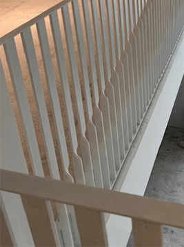 Aluminum balusters installed on modern interior balcony railing