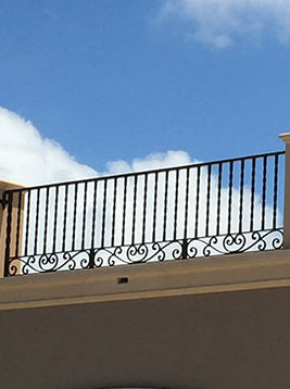 Aluminum deck spindles installed on second story exterior railing