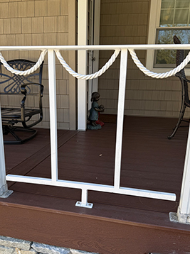 Aluminum porch balusters installed on exterior deck railing