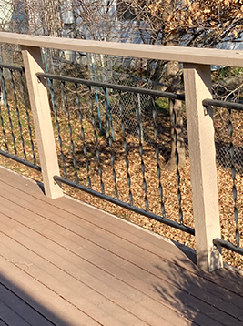 Aluminum railing balusters installed on exterior deck system