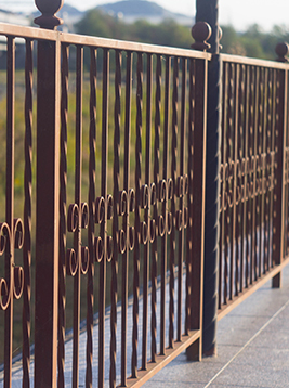 Fence balusters installed on exterior decorative railing