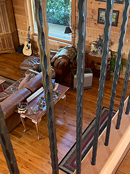 Hammered balusters installed on interior loft railing