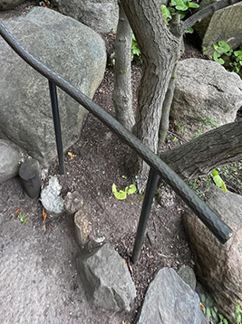 Hammered round bar used in exterior landscape railing