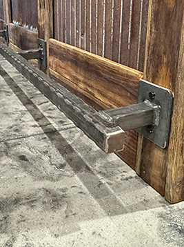 Hammered square tubing installed on bar foot support