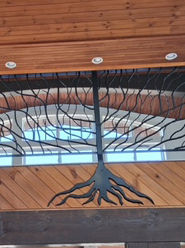 Railing spindles with decorative branch style metal design