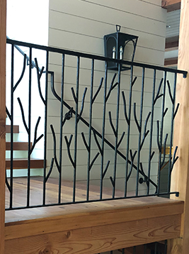 Round balusters installed on interior decorative railing system