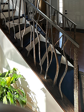 Round iron balusters with decorative branch style design