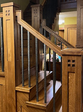 Stair balusters installed on traditional wood staircase