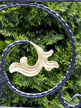 Textured square metal bar with decorative scroll detail