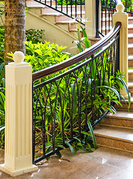 Victorian balusters installed on decorative curved stair railing