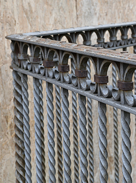 Wrought iron railing balusters with twisted decorative design