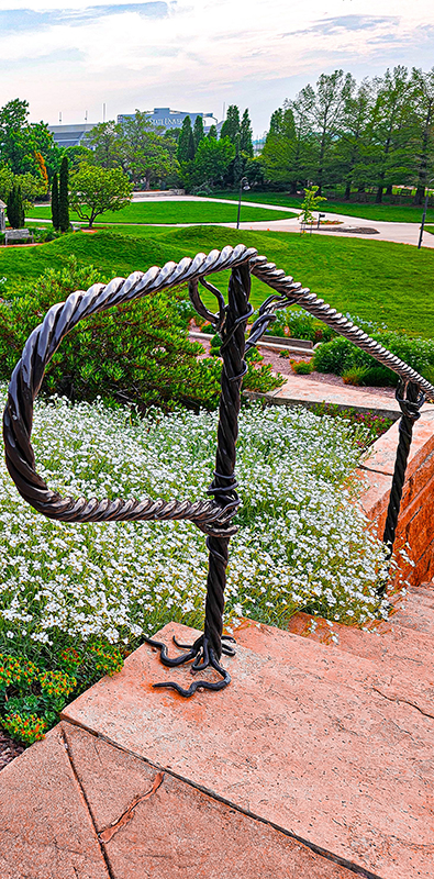 4 strand rope metal bar installed on exterior landscape railing