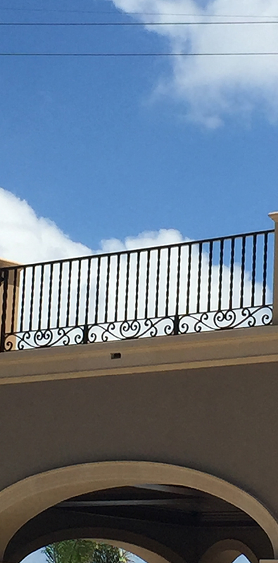Aluminum deck spindles installed on second story exterior railing