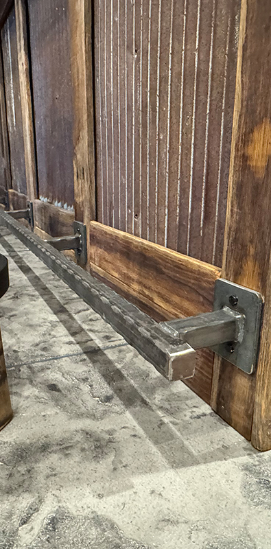 Hammered square tubing installed on bar foot support