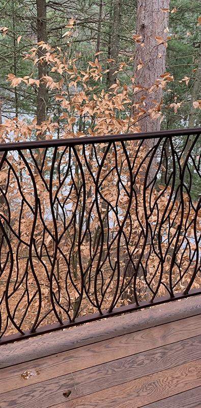 Round deck balusters installed on exterior balcony railing