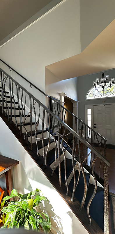 Round iron balusters with decorative branch style design