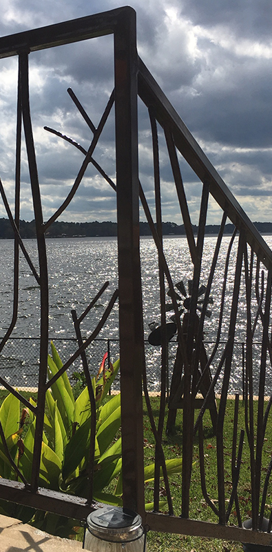 Wood grain spindles installed on exterior decorative railing